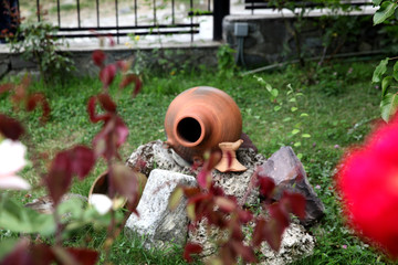 Garden decorated with clay jugs