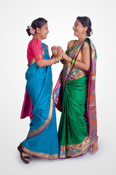 Indian Beautiful young girls in traditional wear saree, Nauvari.