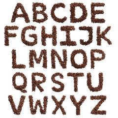  English alphabet of freshly roasted cocoa beans on a white isolated background. coffee pattern made from coffee beans. Font for coffein, the concept of vivacity and culture of coffee. Writing Letters