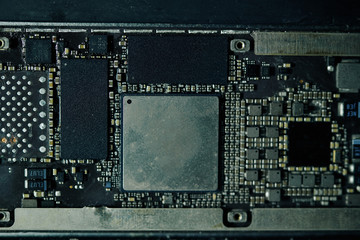 Close-up image of tablet computer motherboard. Technology and innovation concept