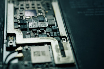 Detail close-up image of smartphone logic panel with system components