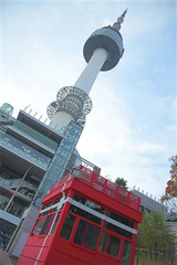 N Seoul Tower with red ticket box at Namsan mountain in South Korea.