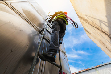 Worker ware safety belts  in construction site close up equipment safety concept,Worker high building outdoors sprinkle with rope safety sure, wear equipment protective
