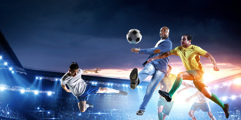 Soccer man in action with ball. Mixed media