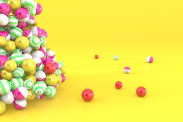 christmas balls on yelow background top view