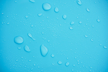 Water drops on blue background.