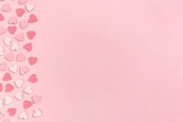 Border frame made of pink pastel hearts