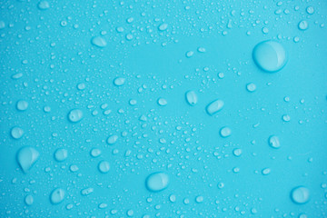 Water drops on blue background.