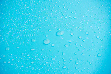 Water drops on blue background.