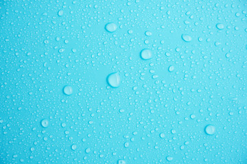 Water drops on blue background.