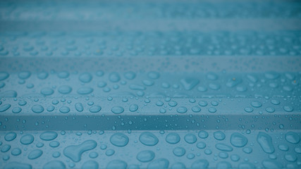  Rain different drops on a blue-green background