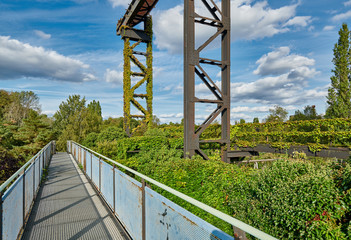 Fototapeta na wymiar Abandoned Industrial factory in Duisburg, Germany. Public park Landschaftspark, landmark and tourist attraction.