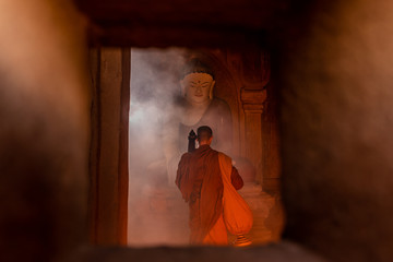A Monks of Buddhism come to respect and make meditation in ancient buddha   a Buddhist temple...