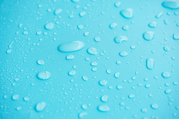 Water drops on blue background.