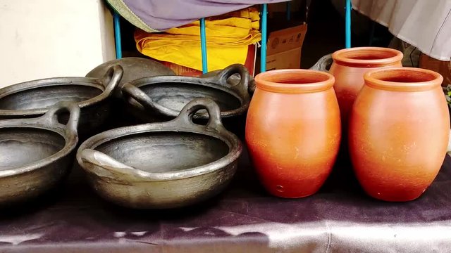 Painted terracotta utensils for kitchen .