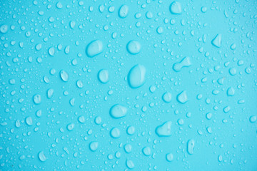 Water drops on blue background.