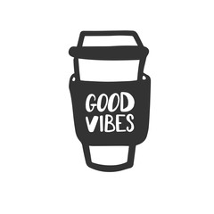 Good vibes. Motivational phrase on a coffee glass. Hand lettering brush and ink.