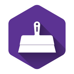 White Putty knife icon isolated with long shadow. Spatula repair tool. Spackling or paint instruments. Purple hexagon button. Vector Illustration