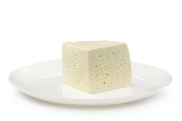 Delicious cheese close up isolated on white studio background. Healthy eating and lifestyle, organic natural nutrition, diet. Delicious food and drinks. Appetizer snack. Milk products.