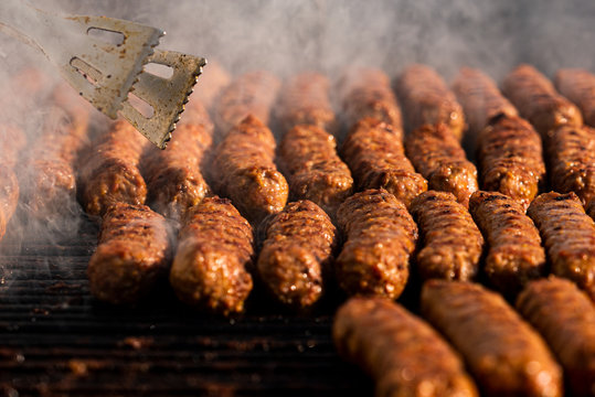 Traditional romanian food Meat Balls - mici on grill