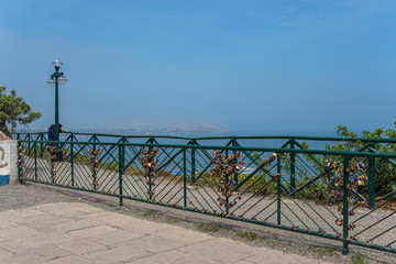 Fototapeta na wymiar Locks hung by lovers on an iron fence in Parque del Amor