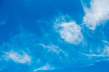 Fototapeta na wymiar blue sky background with white clouds. Copyspace.