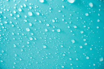 Water drops on blue background.