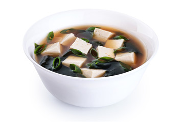 Bowl with miso soup isolated on white background.