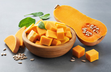 Butternut squash on a gray background.