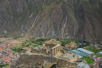 The ruins of the giant buildings and terraces near the town of Ollantaytambo (Peru)