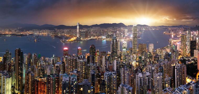 Hong Kong Skyline Panorama At Dramatic Sunset, China - Asia