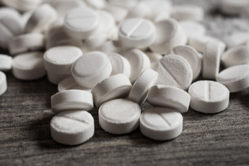 Fototapeta na wymiar Narcotic white pills close up