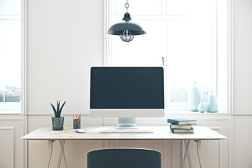 workplace with empty computer screen