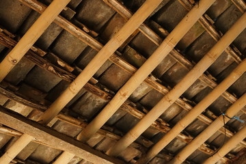 Exposed bamboo and roof tile ceiling