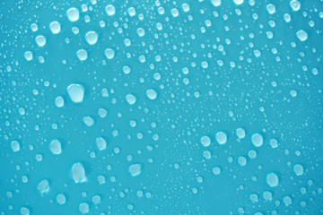 Water drops on blue background.