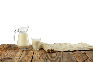 Different milk products, cheese, cream, milk on wooden table and white background. Healthy eating and lifestyle, organic natural nutrition, diet. Delicious food and drinks.