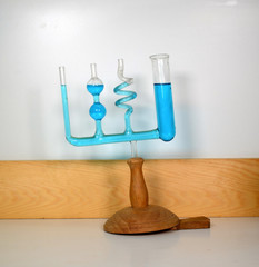 Demonstration model of communicating vessels of different shapes illustrating the principle that...
