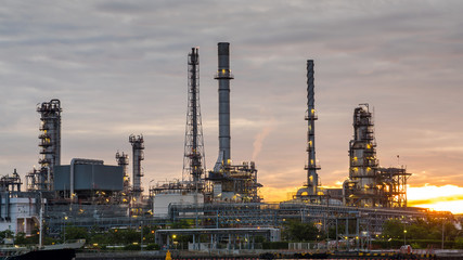 Fototapeta na wymiar Oil and gas refinery plant area at sunrise