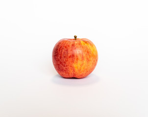 One isolated red apple on white background