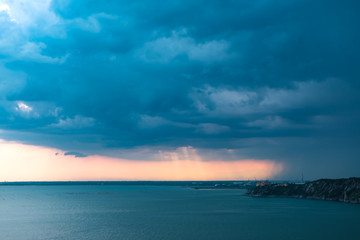 Fototapeta na wymiar Sunset storm in the sky over Trieste
