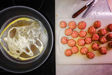 Making Swedish meatballs.