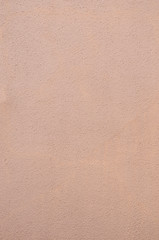 古いピンク色のコンクリート壁