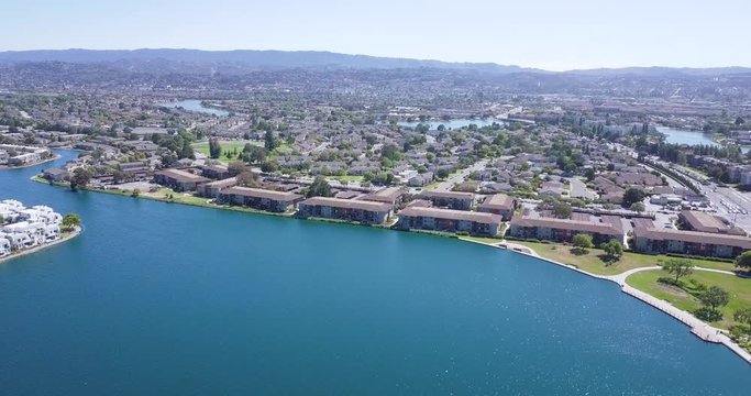 aerial panoramic water front view of metro center tower in foster city near Visa Global HQ on hills dale blvd drone fly rotate right