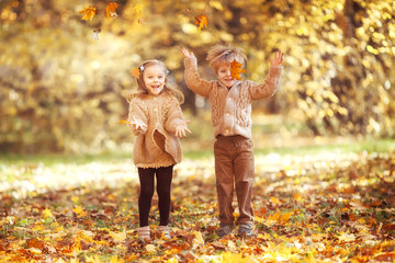 Funny twins in autumn park - 298822158