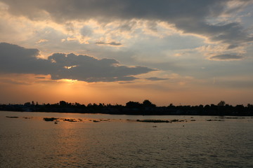 sunset at river in evening