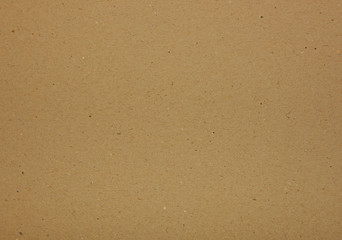 Brown paper parchment background with fibers