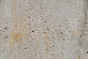 Grunge uneven concrete background texture with rust