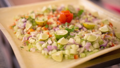Green Salad with mixture of Onion and cucumber Lemon and onion . Home Made healthy Home made salad for healthy life style