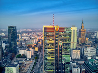 Beautiful panoramic aerial drone view to panorama cityscape of Warsaw modern City, PKiN and "Rondo 1" office skyscraper located at Rondo ONZ