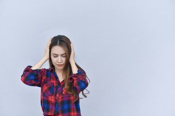 Fototapeta premium Women's headaches, health and pain of women Who is tired of severe headaches / Closeup pictures of women suffering from migraine, pressure and stress High resolution images